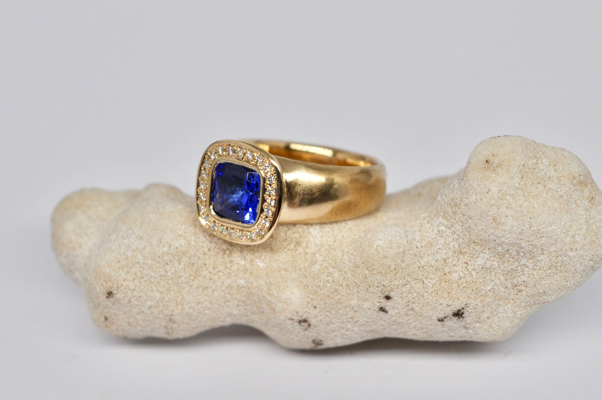 Tanzanite & Diamond Halo Ring — 18k Yellow Gold