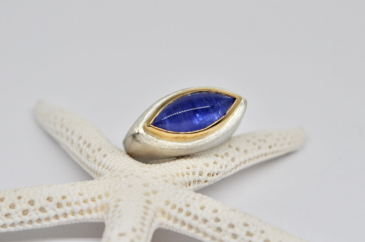 Silver & gold ring, tanzanite cabochon