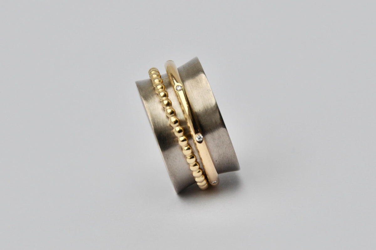 Spinning ring, white and yellow gold rings with diamonds