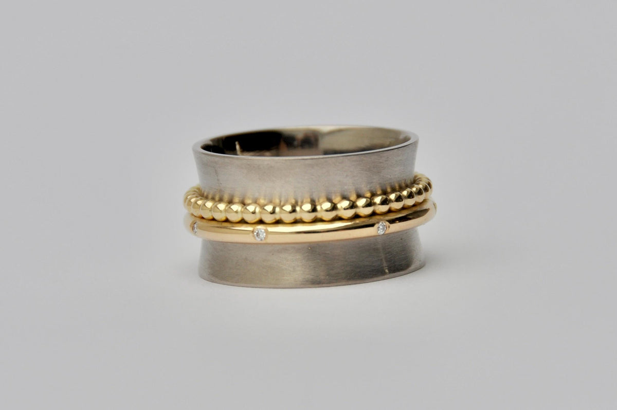 Spinning ring, white and yellow gold rings with diamonds