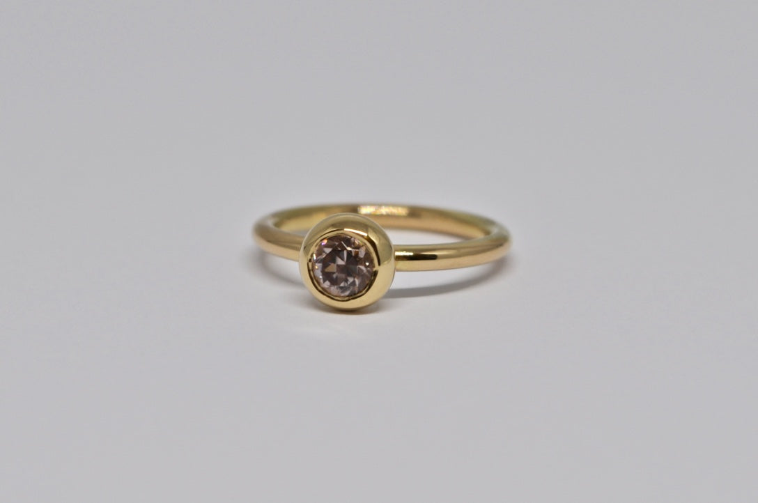 Bezel-Set Pink Zircon Ring in 18K Yellow Gold