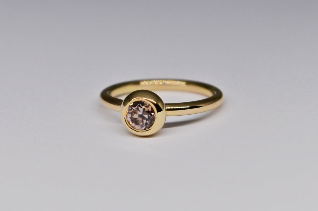 Bezel-Set Pink Zircon Ring in 18K Yellow Gold