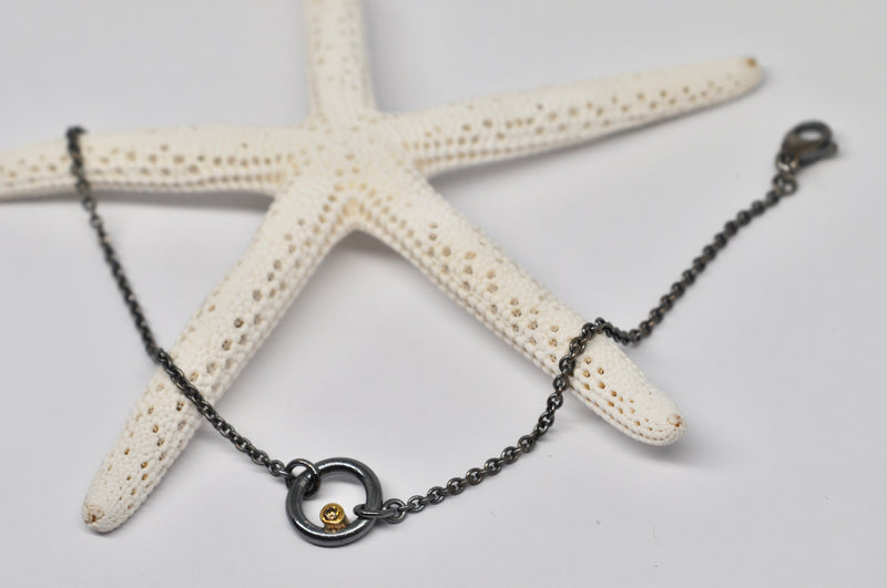 small oxidized silver circle bracelet, brown diamond, gold