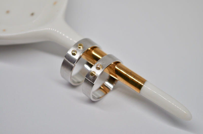 Brushed White Gold Wedding Bands with Yellow Gold & Diamond Accents