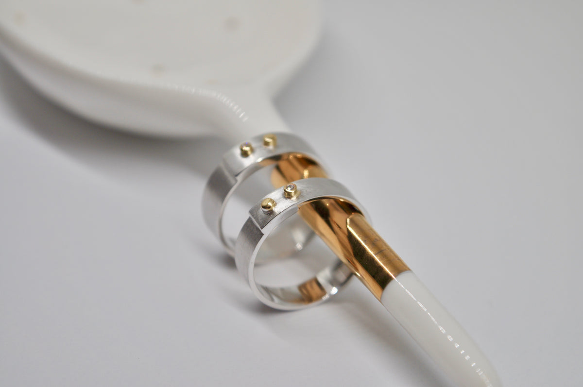 Brushed White Gold Wedding Bands with Yellow Gold & Diamond Accents