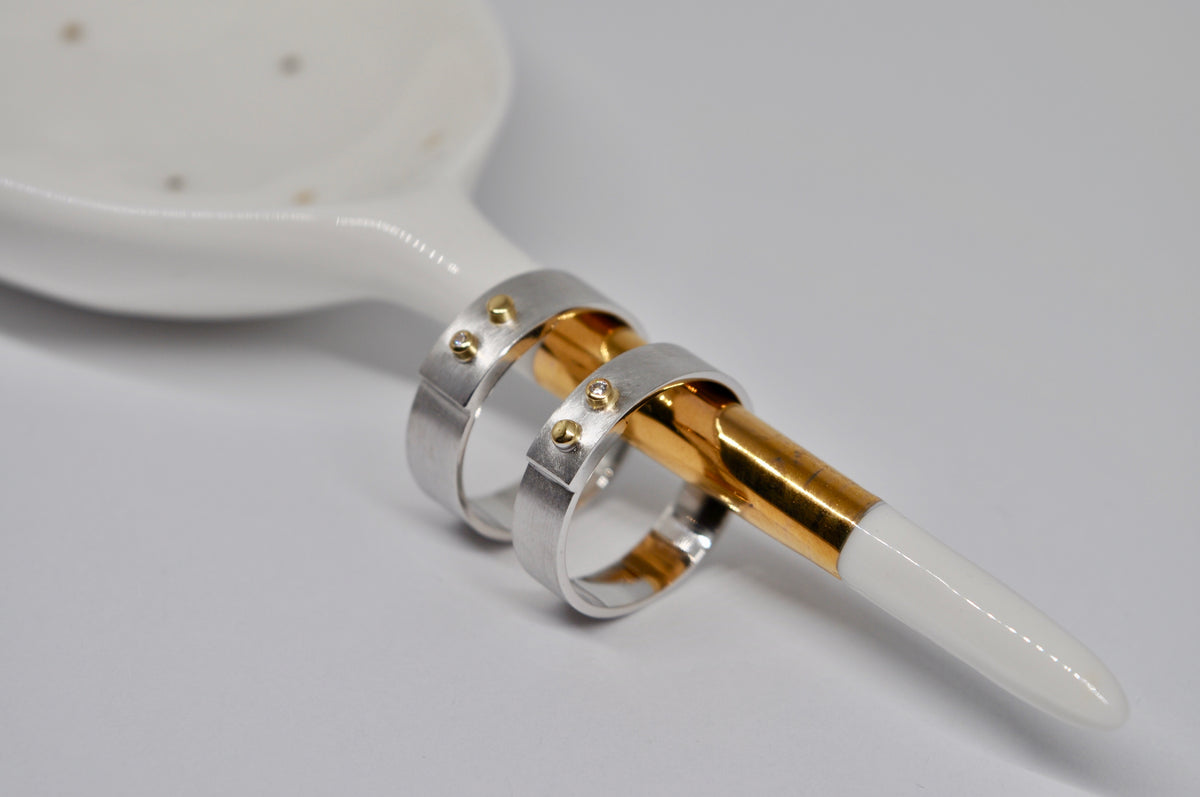 Brushed White Gold Wedding Bands with Yellow Gold & Diamond Accents