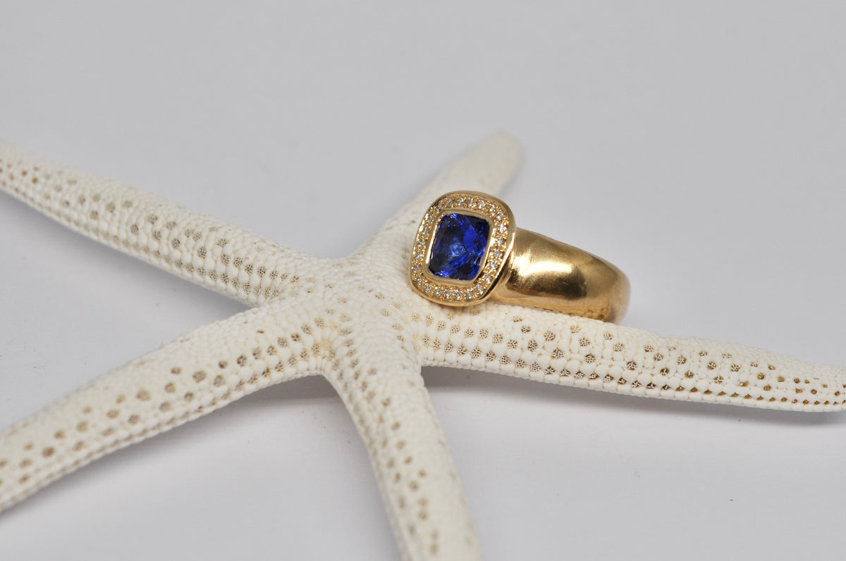 Tanzanite & Diamond Halo Ring — 18k Yellow Gold