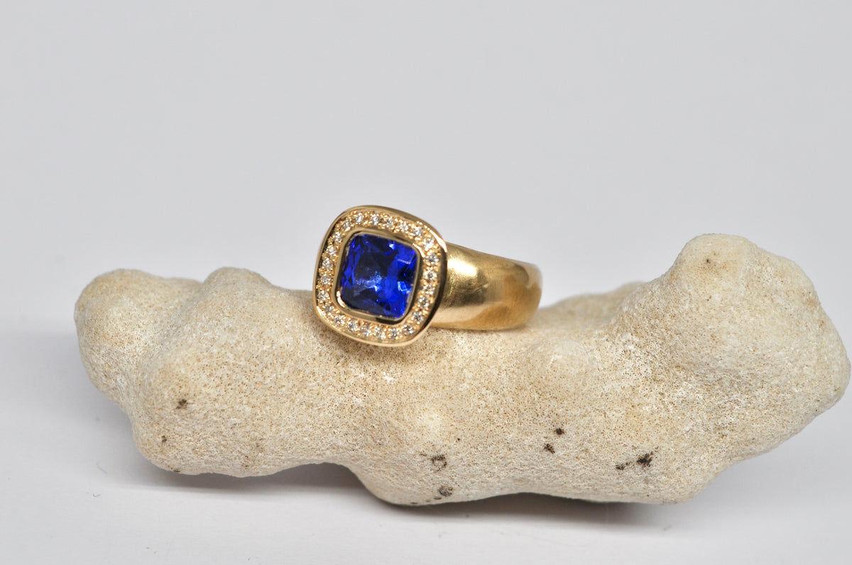 Tanzanite & Diamond Halo Ring — 18k Yellow Gold