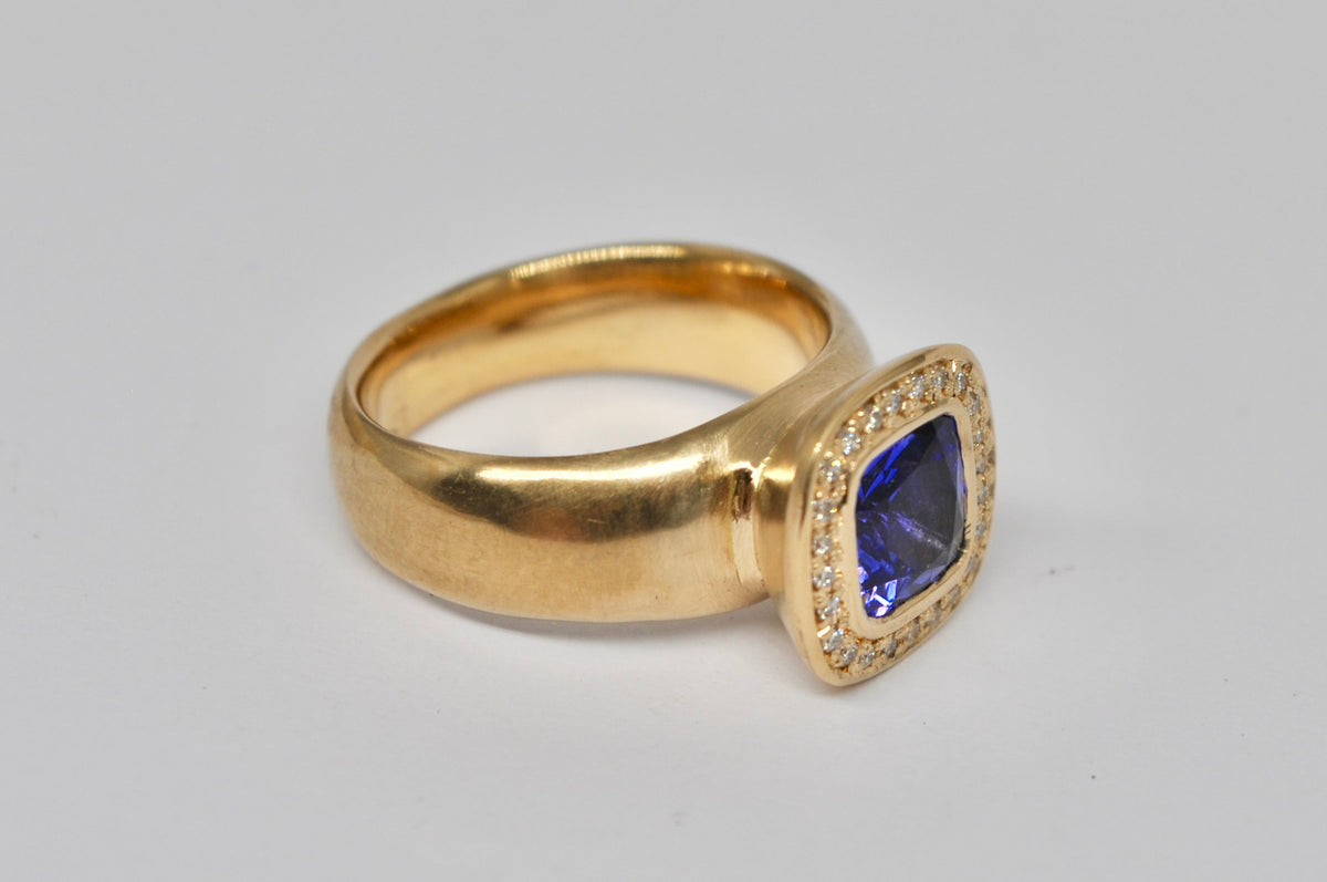 Tanzanite & Diamond Halo Ring — 18k Yellow Gold
