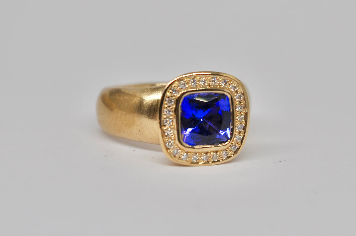 Tanzanite & Diamond Halo Ring — 18k Yellow Gold