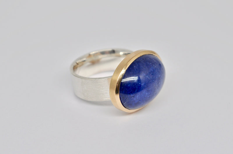 Unique silver and gold ring with tanzanite
