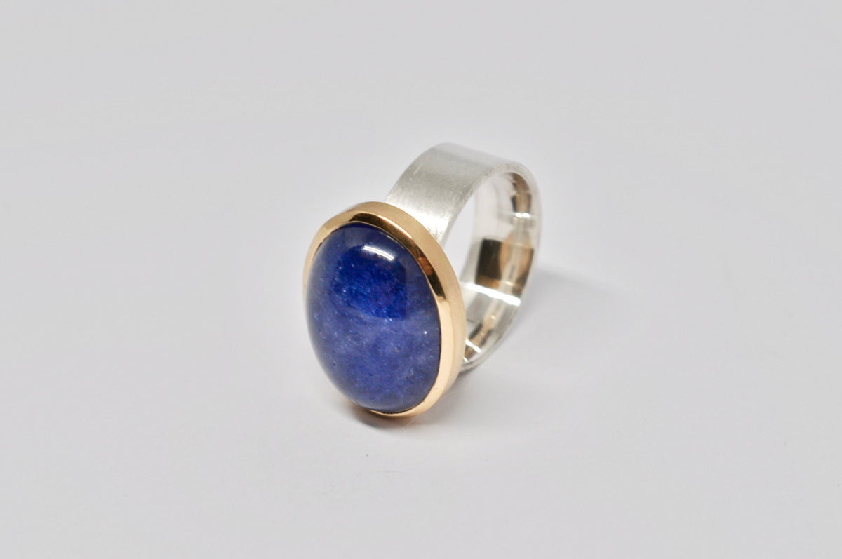 Unique silver and gold ring with tanzanite