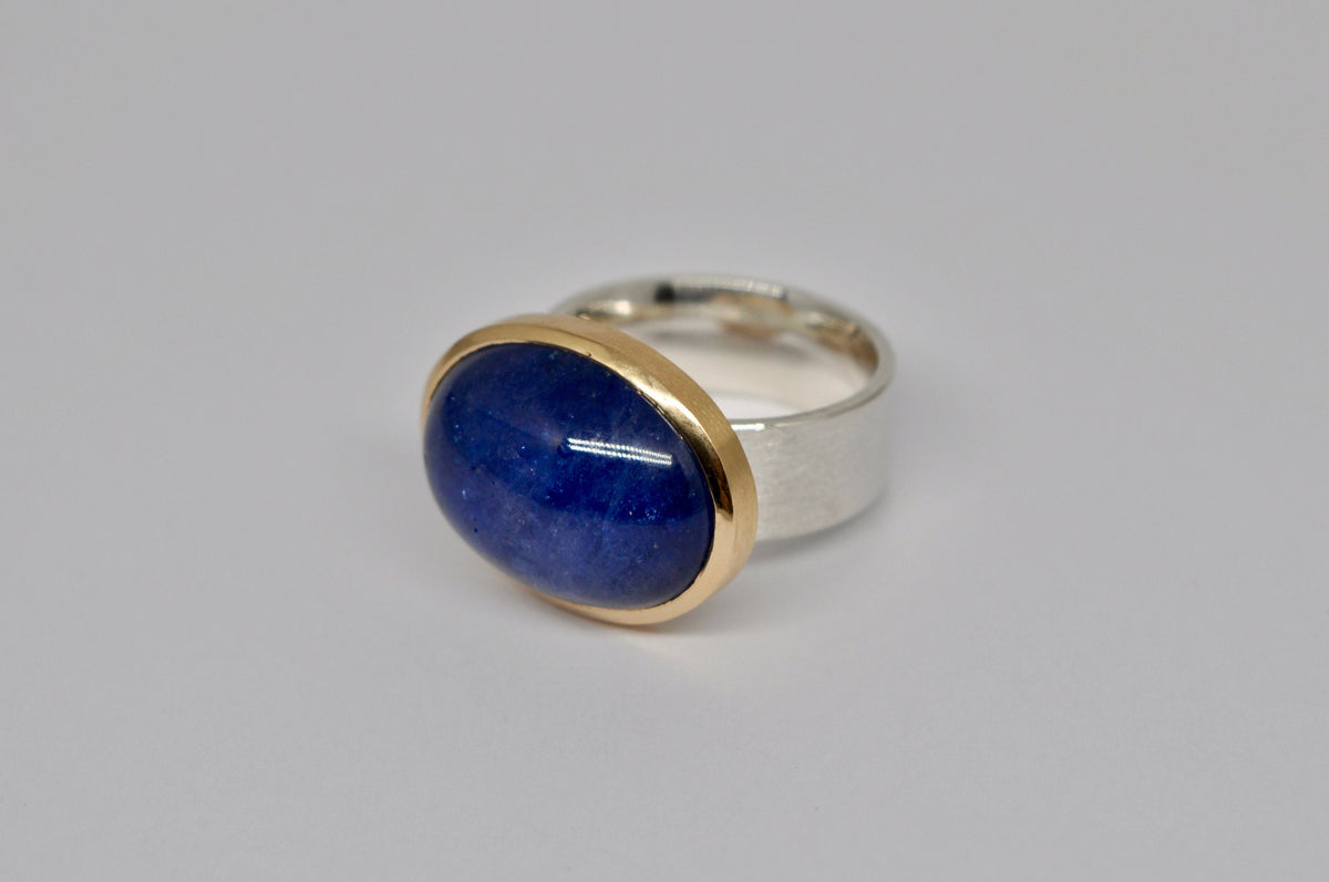 Unique silver and gold ring with tanzanite