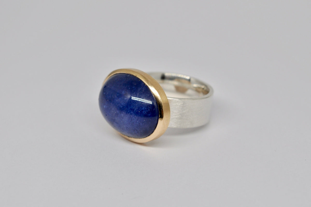 Unique silver and gold ring with tanzanite