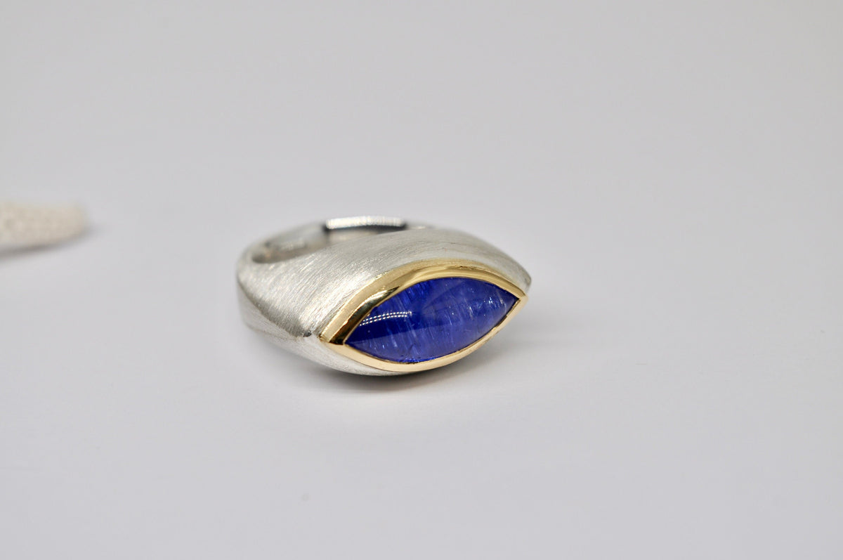 Silver & gold ring, tanzanite cabochon