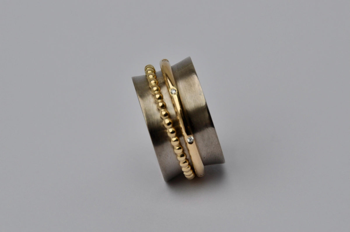 Spinning ring, white and yellow gold rings with diamonds