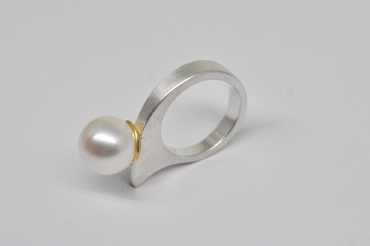 smooth shaped silver and gold ring with freshwater pearl