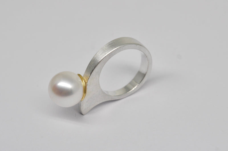 smooth shaped silver and gold ring with freshwater pearl